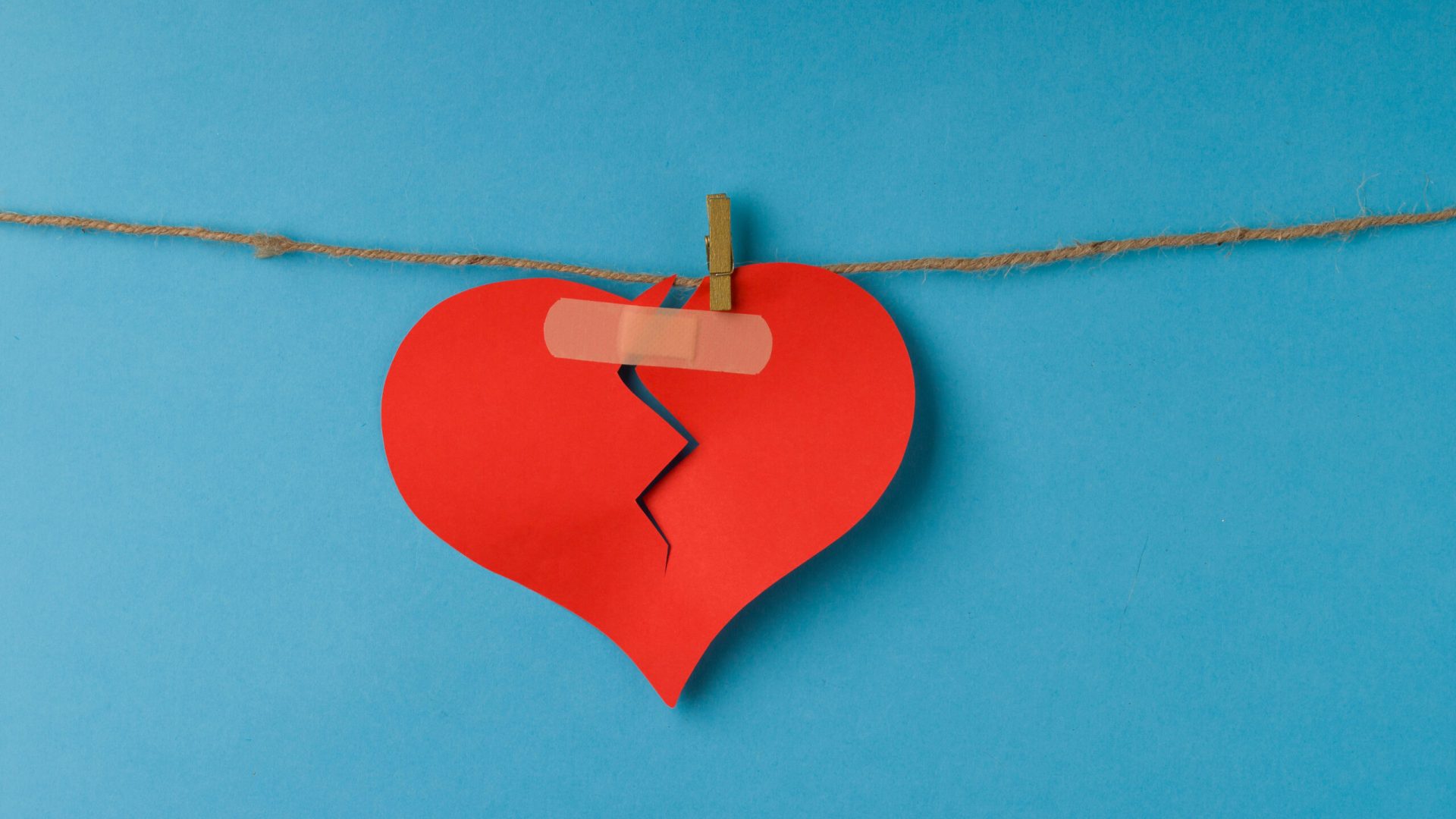 Broken,Paper,Heart,Hanging,On,Rope.,Broken,Red,Heart,Hanging