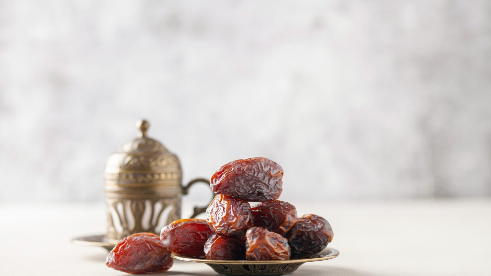 Cup,Of,Coffee,And,Dry,Dates,On,Saucer,Ready,To