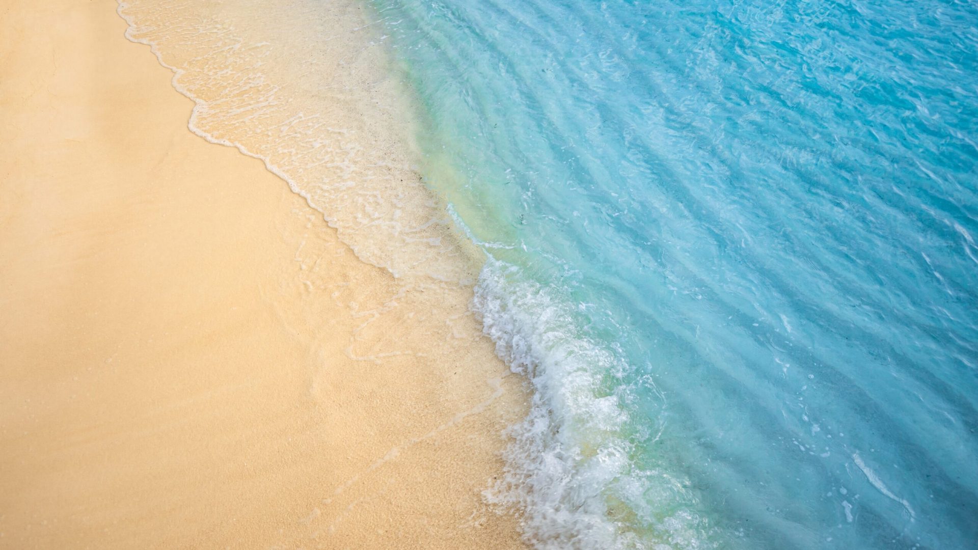 Closeup,Of,Waves,Sand,Beach,And,Blue,Summer,Sea.,Panoramic